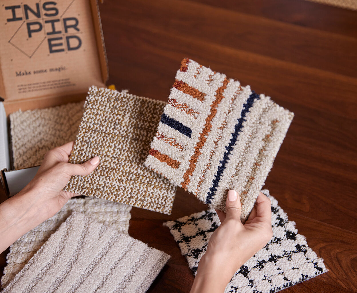 FLOR carpet tile samples in hands